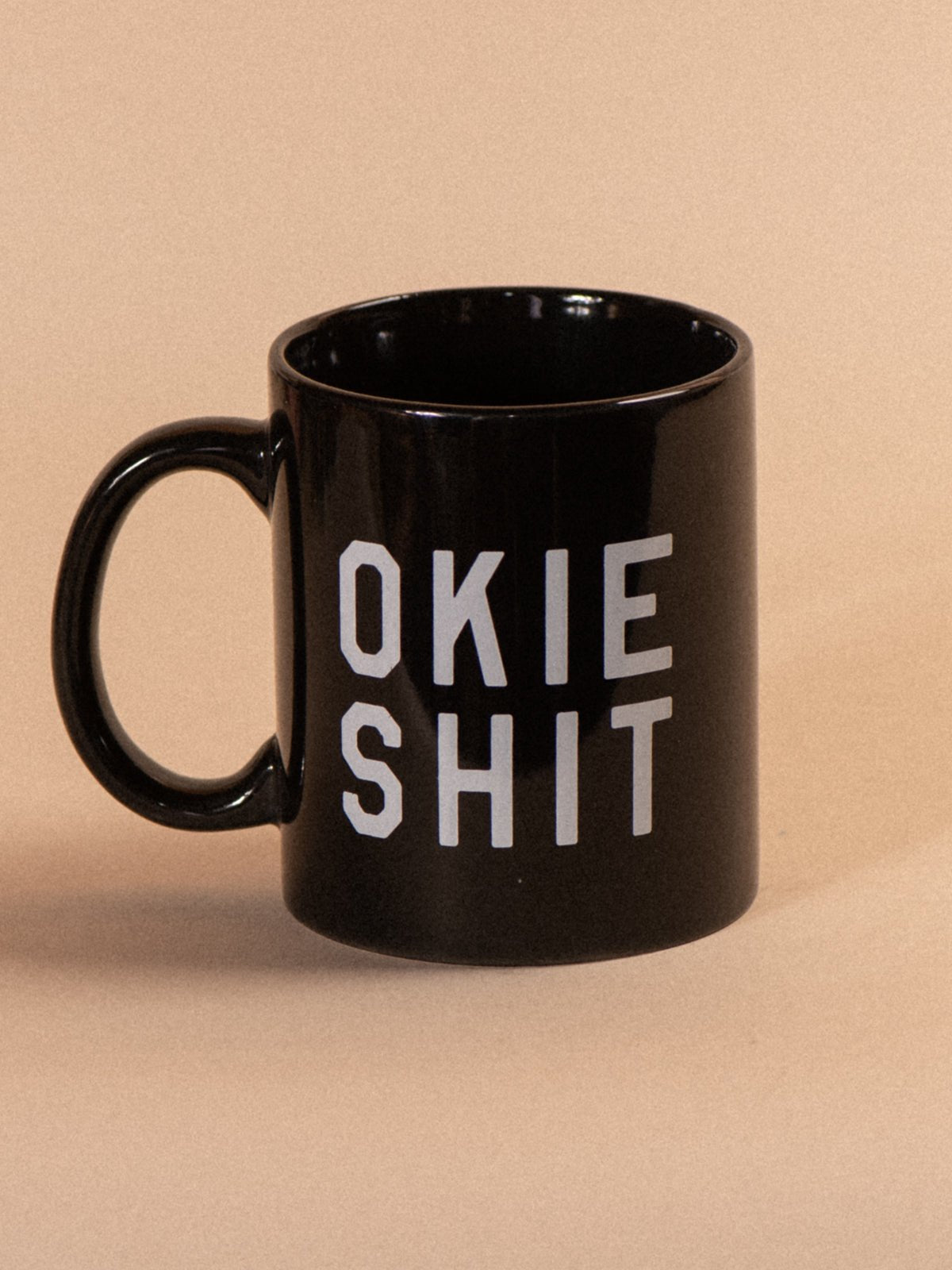 http://tallgrasssupplyco.com/cdn/shop/products/okie-shit-diner-mug-482314.jpg?v=1648452368